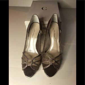 Ladies beautiful Mesh Peekaboo toe 2 1/2-3”heels by Caparros